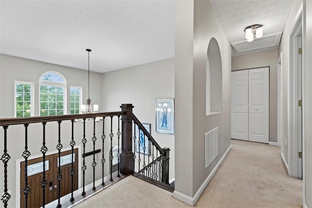 9264 Marshall, Cranberry Twp, PA 16066 - corridor featuring light colored carpet, an upstairs landing, baseboards, and a textured ceiling