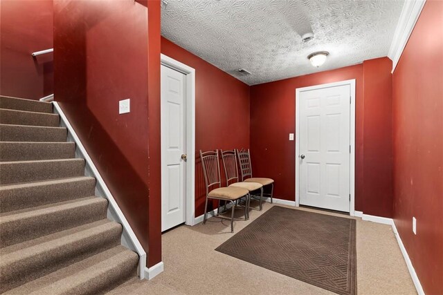 9264 Marshall, Cranberry Twp, PA 16066 - carpeted entryway with stairs, baseboards, and a textured ceiling