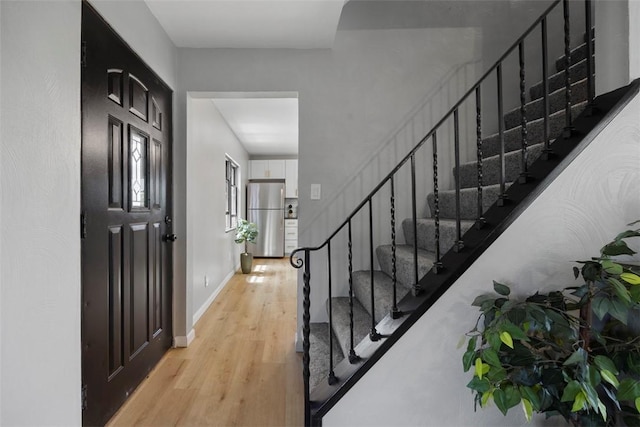 220 Cortina Way, Overbrook, PA 15234 - stairway featuring wood finished floors and baseboards