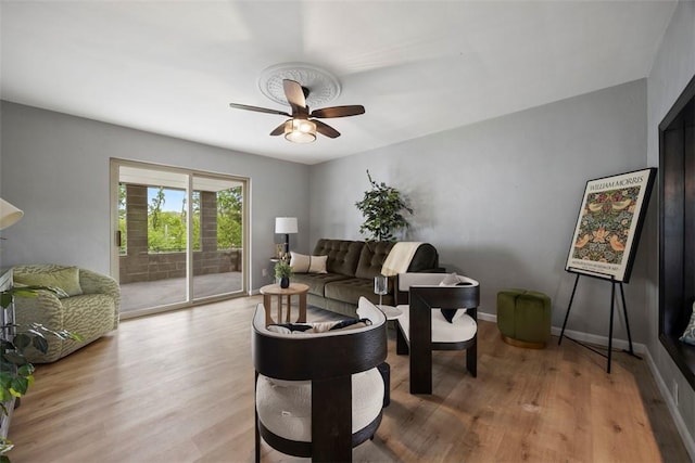 220 Cortina Way, Overbrook, PA 15234 - living area featuring ceiling fan, light wood finished floors, and baseboards