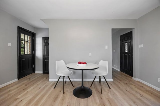 220 Cortina Way, Overbrook, PA 15234 - dining room with light wood finished floors and baseboards