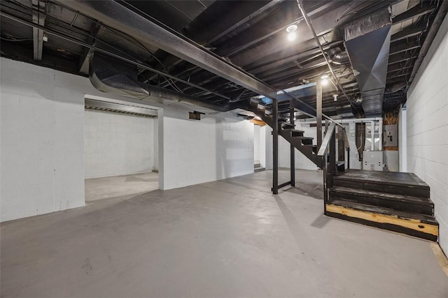 220 Cortina Way, Overbrook, PA 15234 - unfinished basement with stairs and concrete block wall