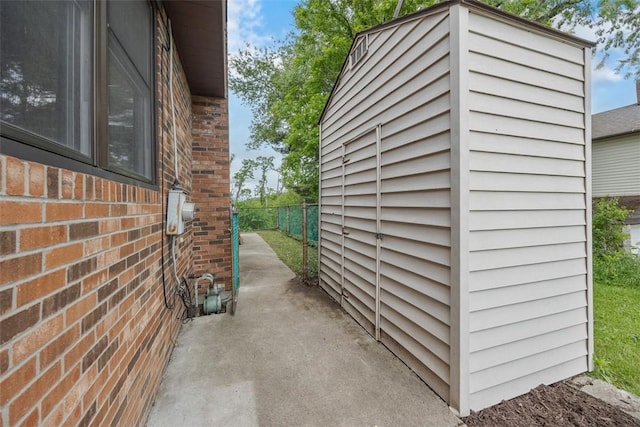 220 Cortina Way, Overbrook, PA 15234 - view of side of home with a patio area and brick siding