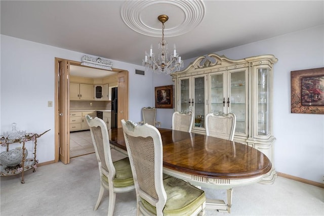 110 Ardennes Ct, Trafford, PA 15085 - dining room with a chandelier, light colored carpet, and baseboards