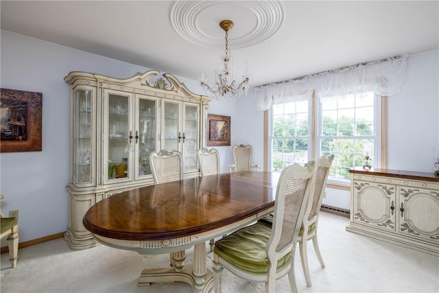 110 Ardennes Ct, Trafford, PA 15085 - dining room featuring a chandelier, light carpet, and baseboards