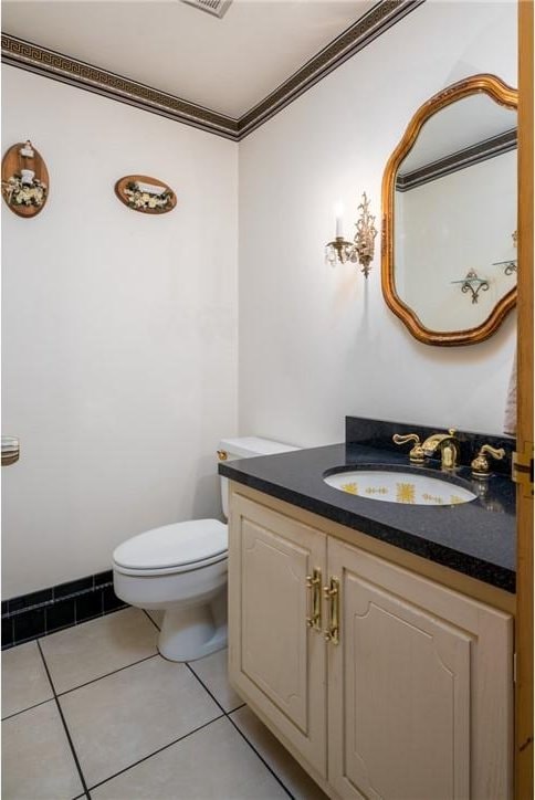 110 Ardennes Ct, Trafford, PA 15085 - bathroom featuring vanity, toilet, ornamental molding, and tile patterned flooring