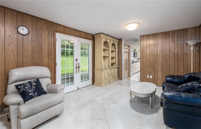 110 Ardennes Ct, Trafford, PA 15085 - sitting room with wood walls, french doors, and light tile patterned flooring