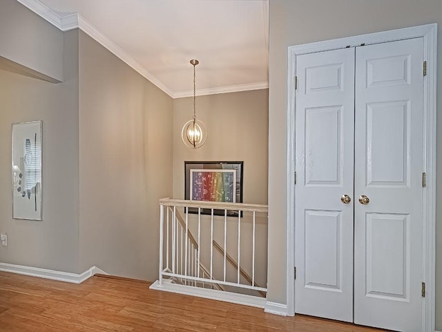 824 Kingsberry Cir, Mt Lebanon, PA 15234 - corridor featuring an upstairs landing, wood finished floors, crown molding, baseboards, and a chandelier