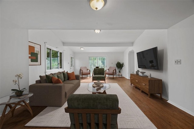 1519 Belasco Ave, Beechview, PA 15216 - living area with plenty of natural light, wood finished floors, arched walkways, and baseboards