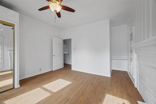 1519 Belasco Ave, Beechview, PA 15216 - unfurnished bedroom with wood finished floors, a ceiling fan, and baseboards