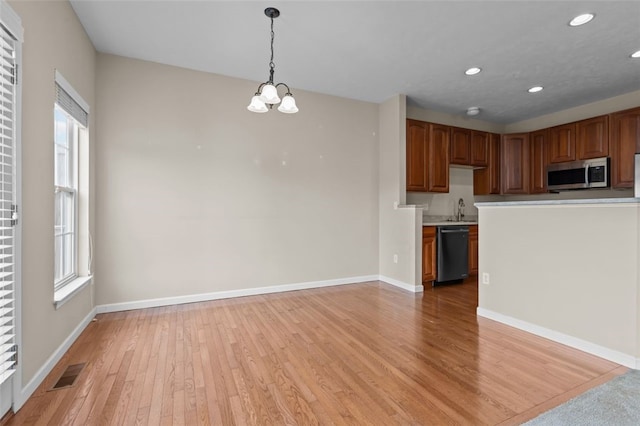 190 Southern Valley Ct, Adams Twp, PA 16046 - kitchen featuring stainless steel microwave, dishwashing machine, light wood-type flooring, a sink, and recessed lighting