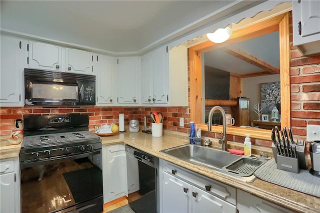 304 Petain St, Ellwood City Law, PA 16117 - kitchen with black appliances, a sink, light countertops, and decorative backsplash