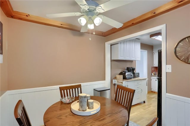 304 Petain St, Ellwood City Law, PA 16117 - dining area with ceiling fan, wainscoting, and light wood finished floors