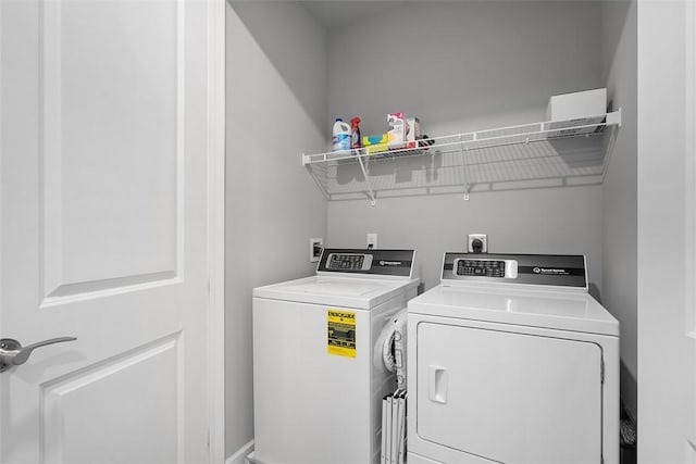 303 Tillary Ln Unit 201, Cranberry Twp, PA 16066 - washroom with washer and clothes dryer