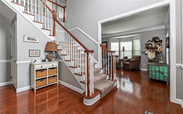 122 Brighton Ln, Adams Twp, PA 16046 - stairs with wood-type flooring, baseboards, and crown molding