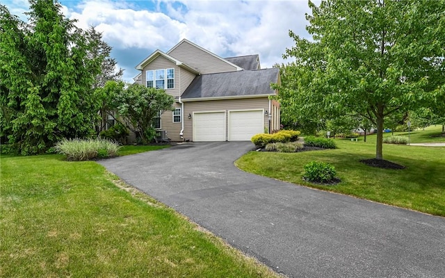 122 Brighton Ln, Adams Twp, PA 16046 - view of front of home with driveway, an attached garage, a front lawn, central AC unit, and a shingled roof