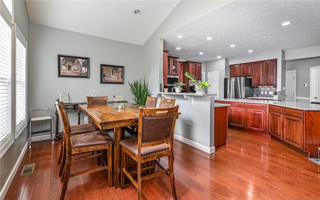 122 Brighton Ln, Adams Twp, PA 16046 - dining room featuring dark wood-type flooring, plenty of natural light, recessed lighting, and baseboards