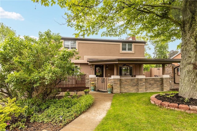 887 E Arcadia Dr, Mccandless, PA 15237 - view of front of house featuring a fenced front yard, stucco siding, a gate, stone siding, and a chimney