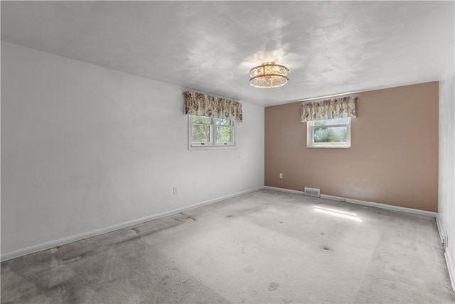 887 E Arcadia Dr, Mccandless, PA 15237 - carpeted empty room with baseboards and a chandelier