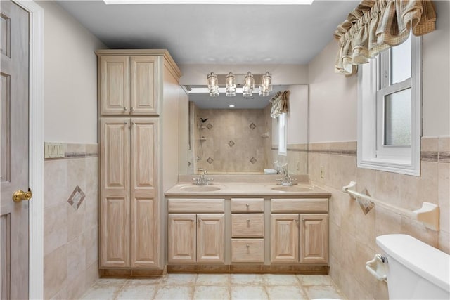 887 E Arcadia Dr, Mccandless, PA 15237 - full bath featuring tile walls, a shower, double vanity, and wainscoting