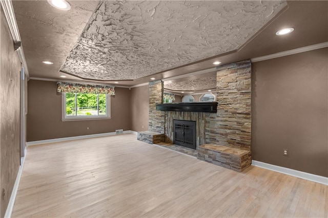 887 E Arcadia Dr, Mccandless, PA 15237 - unfurnished living room with ornamental molding, a fireplace, wood finished floors, and recessed lighting