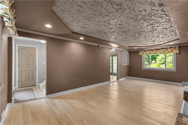 887 E Arcadia Dr, Mccandless, PA 15237 - unfurnished room with ornamental molding, light wood-style flooring, arched walkways, and recessed lighting