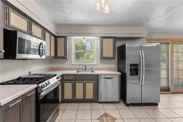 887 E Arcadia Dr, Mccandless, PA 15237 - kitchen with appliances with stainless steel finishes, light countertops, and light tile patterned flooring