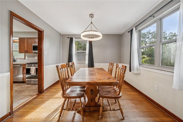 307 Schwartz Ave, Shaler, PA 15209 - dining room with light wood-style floors and baseboards