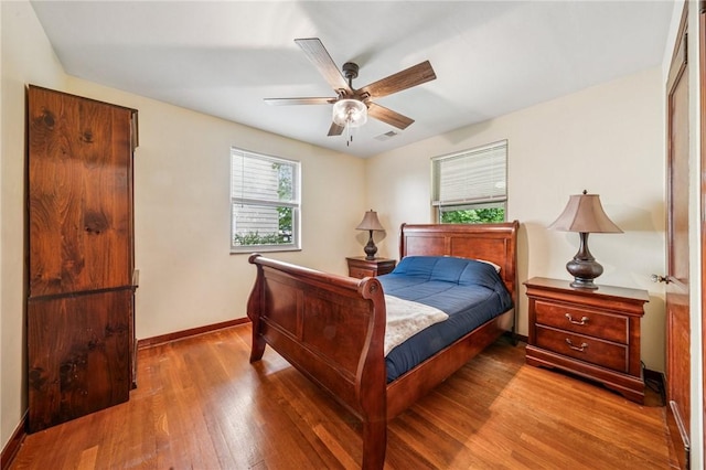 307 Schwartz Ave, Shaler, PA 15209 - bedroom with baseboards, wood finished floors, and ceiling fan