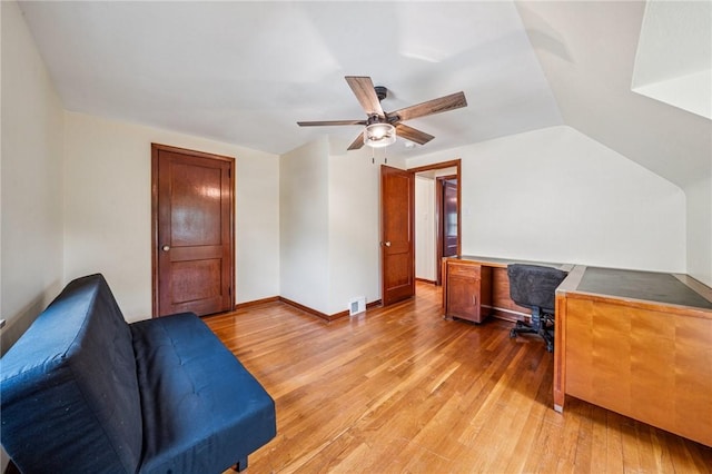 307 Schwartz Ave, Shaler, PA 15209 - home office featuring light wood-style floors, a ceiling fan, built in desk, baseboards, and vaulted ceiling