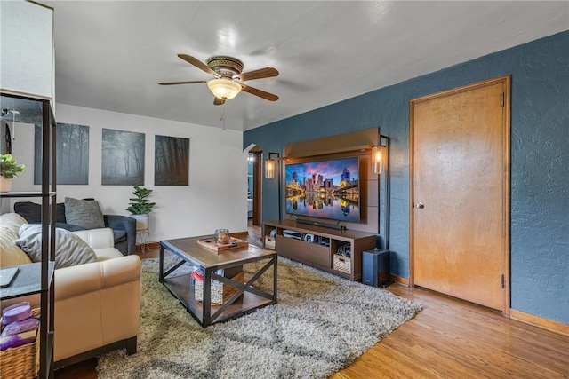 1520 Worcester Dr, Pittsburgh, PA 15243 - living room with a textured wall, ceiling fan, wood finished floors, and baseboards