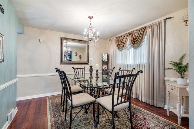 3500 Willett, Baldwin Boro, PA 15227 - dining area featuring wood finished floors, a chandelier, and baseboards
