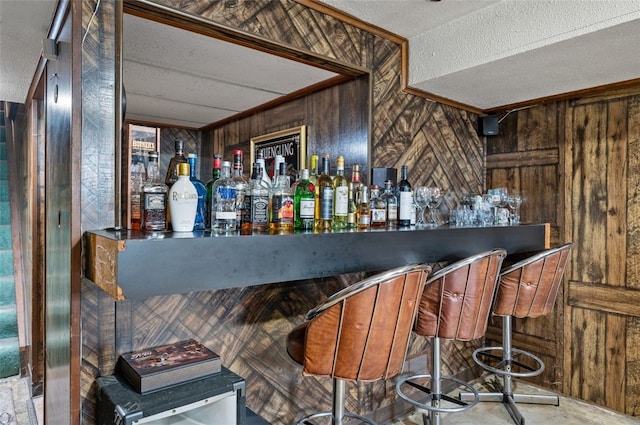 3500 Willett, Baldwin Boro, PA 15227 - indoor dry bar featuring wood walls and a textured ceiling