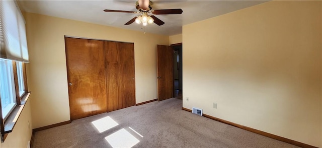 32 John Dr, Hanover Twp Wsh, PA 15021 - unfurnished bedroom with carpet floors, a closet, baseboards, and ceiling fan