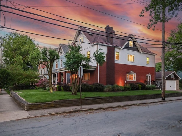 204 Biddle Ave, Regent Square, PA 15221 - view of front property featuring a chimney, a lawn, and brick siding