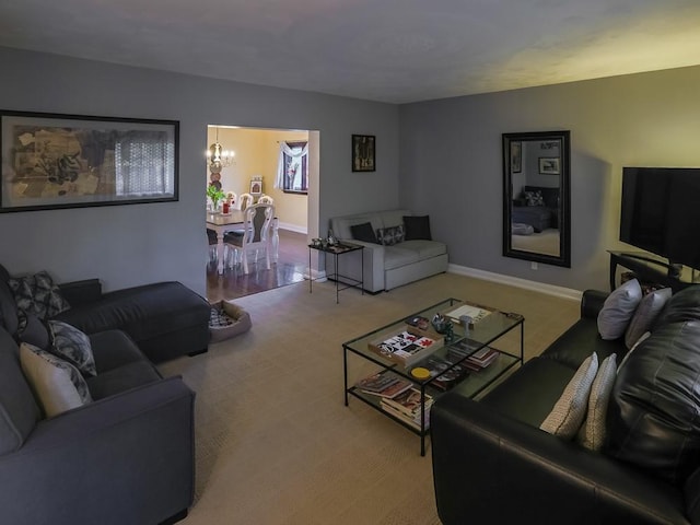 204 Biddle Ave, Regent Square, PA 15221 - living room featuring a chandelier, carpet floors, and baseboards