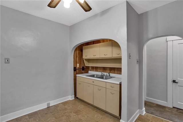 2914 5th Ave, Beaver Falls, PA 15010 - bar area with a sink, arched walkways, ceiling fan, and baseboards