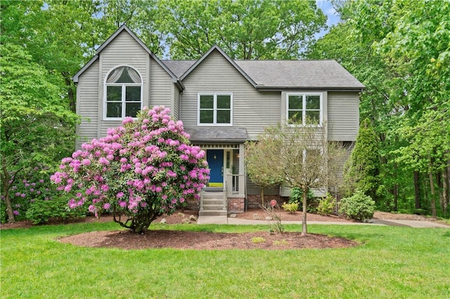 2662 Timberglen Dr W, Franklin Park, PA 15090 - view of front of home featuring a front lawn, roof with shingles, and entry steps