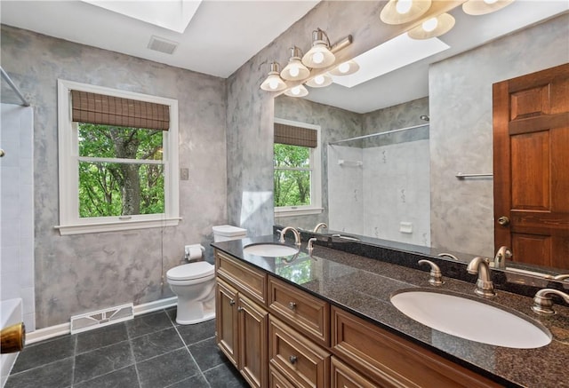2662 Timberglen Dr W, Franklin Park, PA 15090 - bathroom with tile patterned flooring, double vanity, a skylight, toilet, and bathtub / shower combination