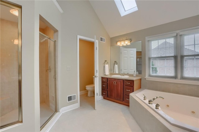 606 Adare Ct, Cranberry Twp, PA 16066 - full bathroom with a skylight, a shower stall, a whirlpool tub, vanity, and toilet