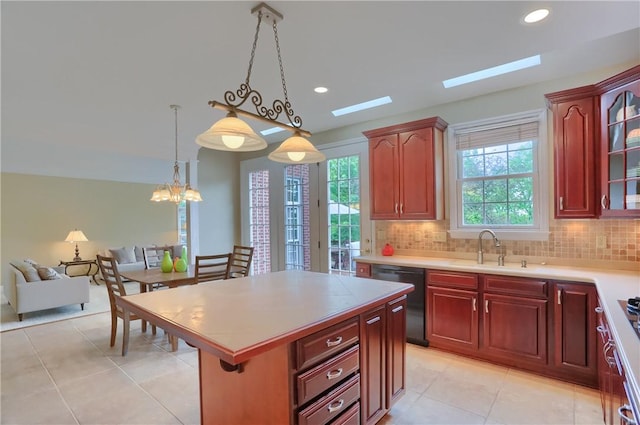 606 Adare Ct, Cranberry Twp, PA 16066 - kitchen with dishwasher, a sink, reddish brown cabinets, open floor plan, and light tile patterned floors