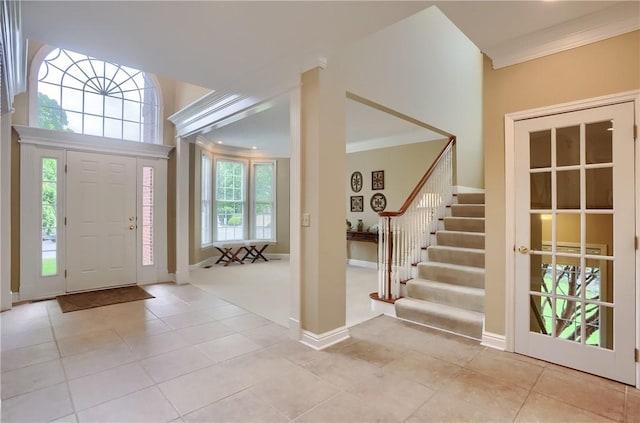 606 Adare Ct, Cranberry Twp, PA 16066 - entryway featuring crown molding, tile patterned floors, stairway, and baseboards