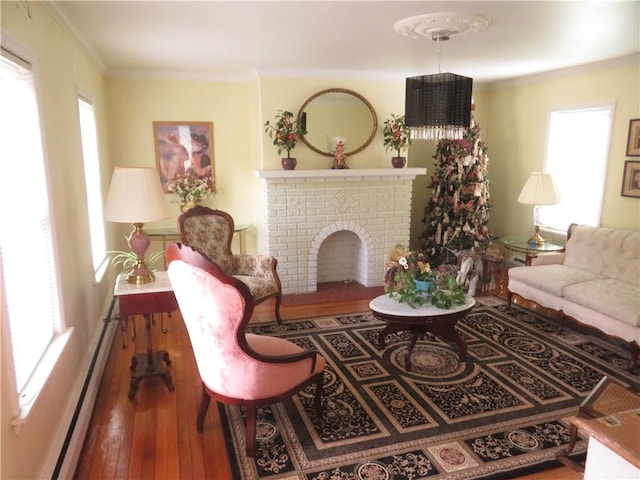 629 Freeport Rd, Jefferson Twp But, PA 16002 - living room featuring hardwood / wood-style floors, plenty of natural light, baseboard heating, ornamental molding, and a fireplace