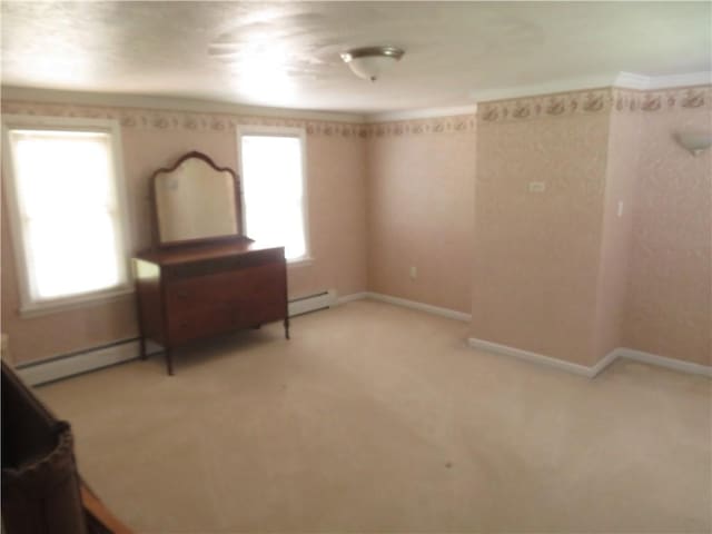 629 Freeport Rd, Jefferson Twp But, PA 16002 - unfurnished bedroom with baseboard heating, light colored carpet, and baseboards