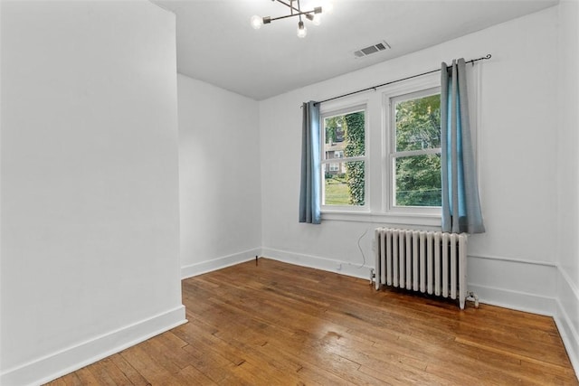 2847 Beechwood Blvd, Squirrel Hill, PA 15217 - unfurnished room with radiator, a chandelier, hardwood / wood-style floors, and baseboards