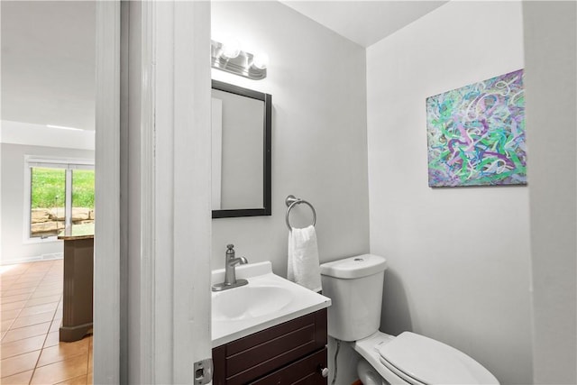 2507 Corteland Dr, Upper St Clair, PA 15241 - half bath with vanity, toilet, and tile patterned flooring