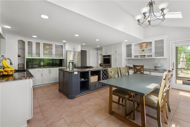 2507 Corteland Dr, Upper St Clair, PA 15241 - dining room featuring light tile patterned floors, a chandelier, recessed lighting, and lofted ceiling