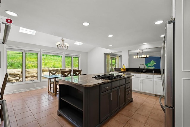 2507 Corteland Dr, Upper St Clair, PA 15241 - kitchen with appliances with stainless steel finishes, light tile patterned floors, a chandelier, a sink, and recessed lighting