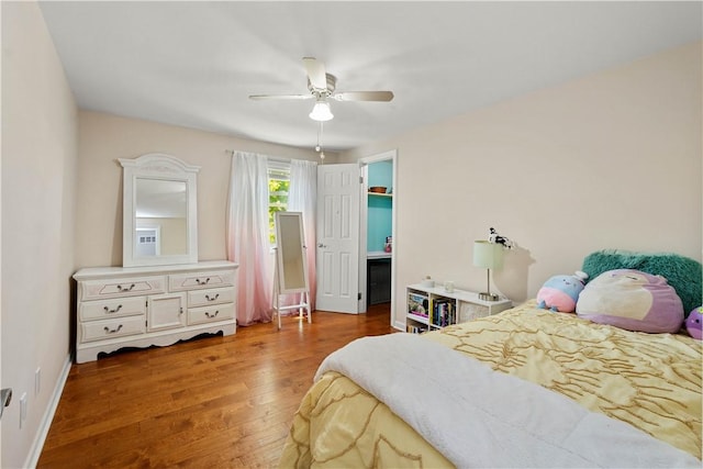 2507 Corteland Dr, Upper St Clair, PA 15241 - bedroom with wood finished floors, a walk in closet, a ceiling fan, and baseboards
