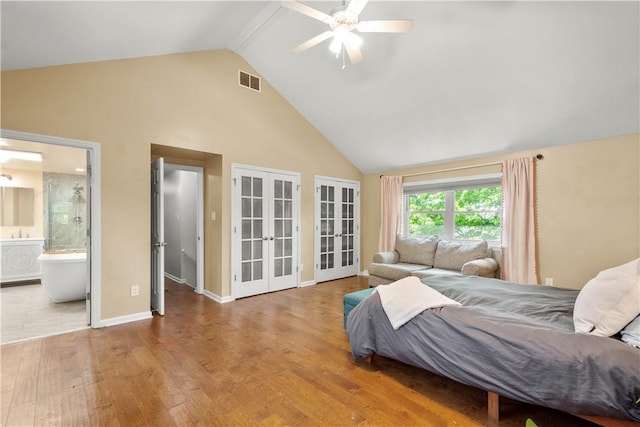 2507 Corteland Dr, Upper St Clair, PA 15241 - bedroom featuring french doors, high vaulted ceiling, wood finished floors, ensuite bath, and baseboards